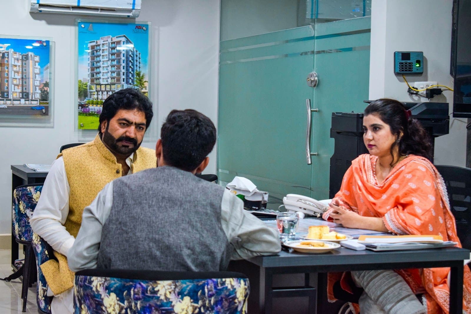 Business owners discussing requirements in an office meeting